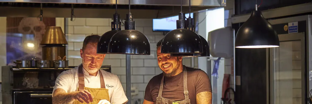 Two chefs working at Chez Mal