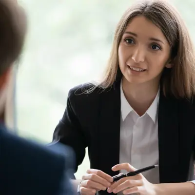 Woman speaking to man